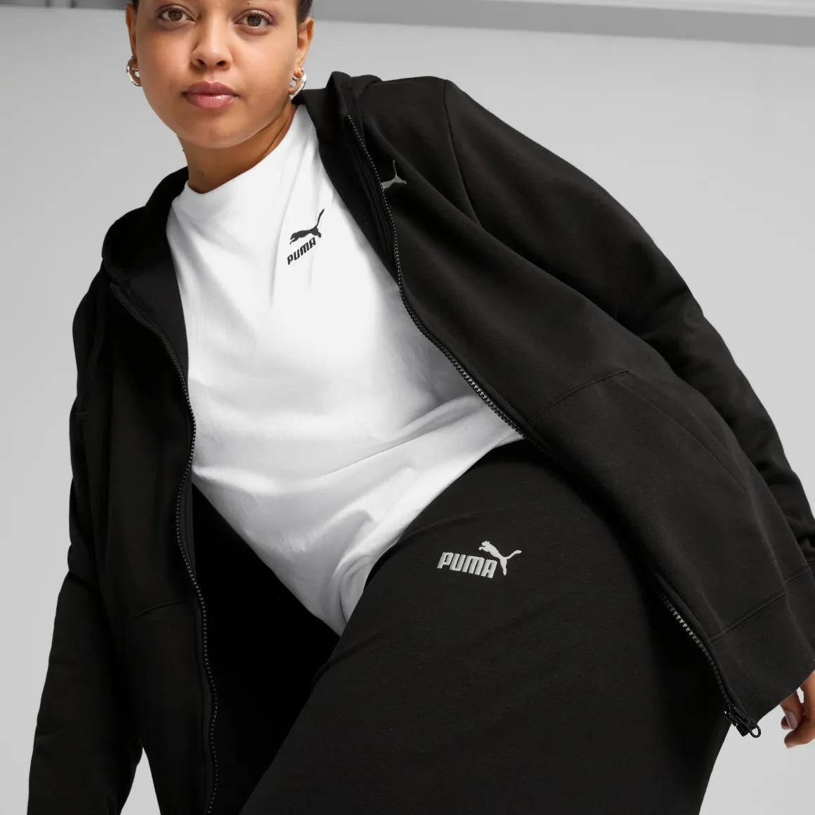 Pantaloni sportivi e casual neri in cotone da donna con logo Puma