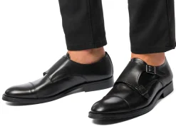 Scarpe monk-strap nere eleganti in pelle con chiusura a doppia fibbia da uomo Primopiano