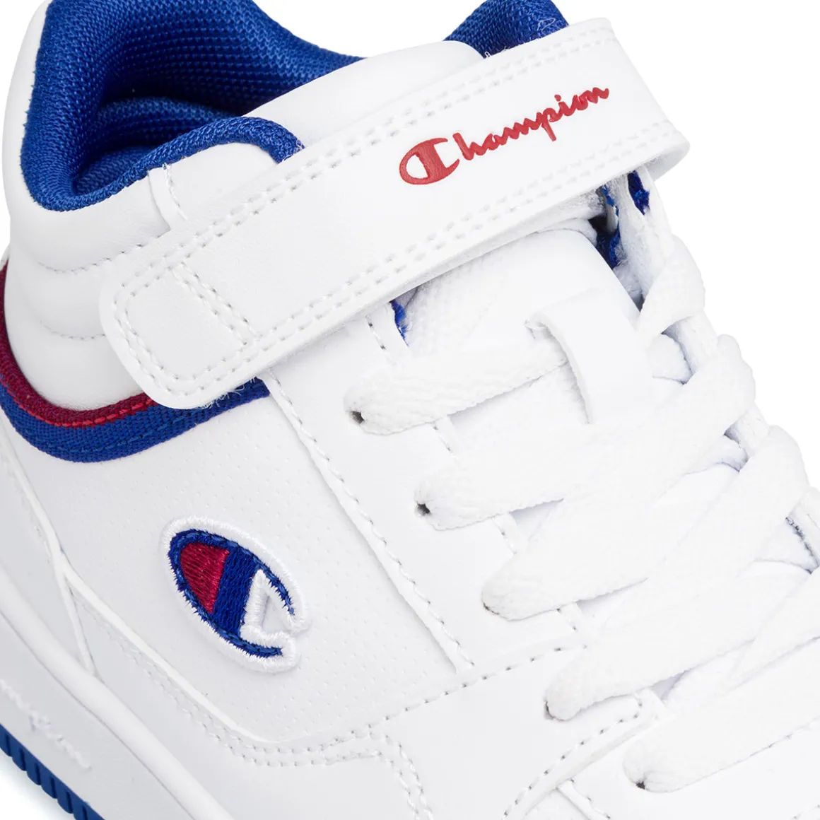 Sneakers alte da ragazzo bianche con logo Champion Rebound Mid