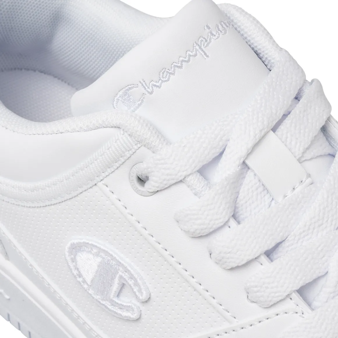 Sneakers bianche da uomo con logo laterale Champion Rebound Low