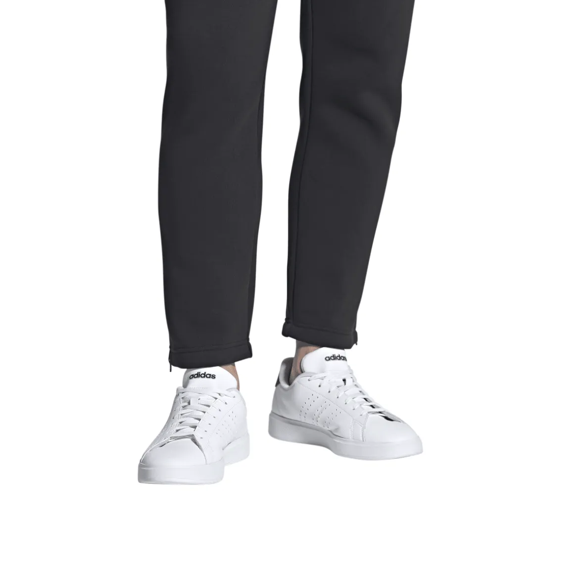 Sneakers bianche Unisex con dettagli logo traforati laterali adidas