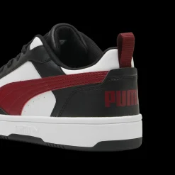Sneakers casual da uomo bianche con dettagli neri e rossi e logo Puma Rebound V6