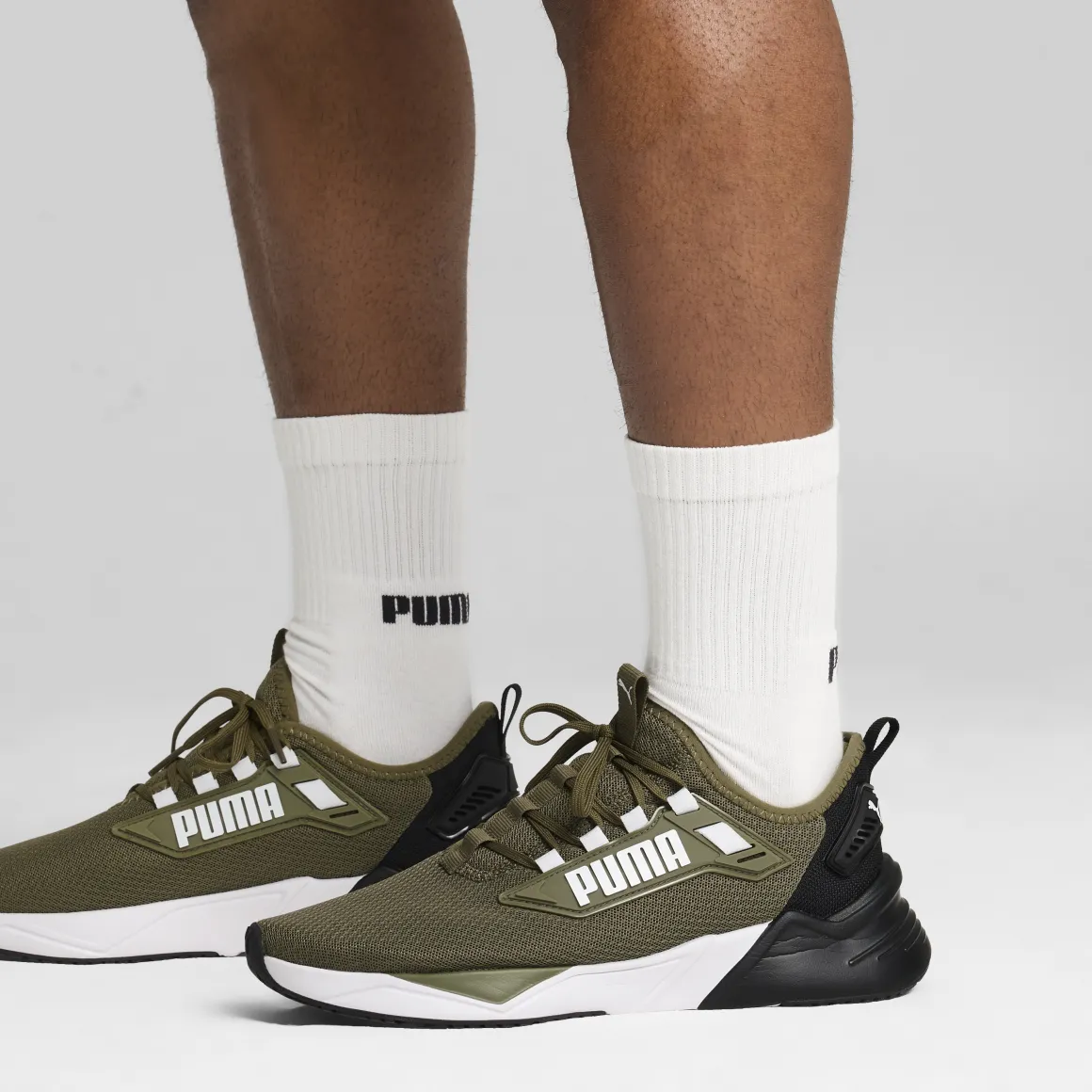 Sneakers da uomo verde militare con logo Puma Retaliate 3
