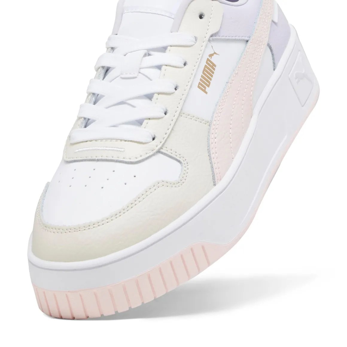 Sneakers platform casual da donna bianche con dettagli rosa e logo Puma Carina Street
