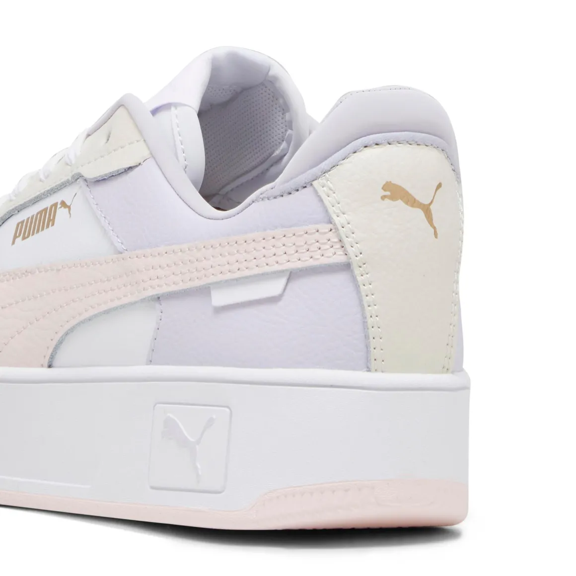 Sneakers platform casual da donna bianche con dettagli rosa e logo Puma Carina Street