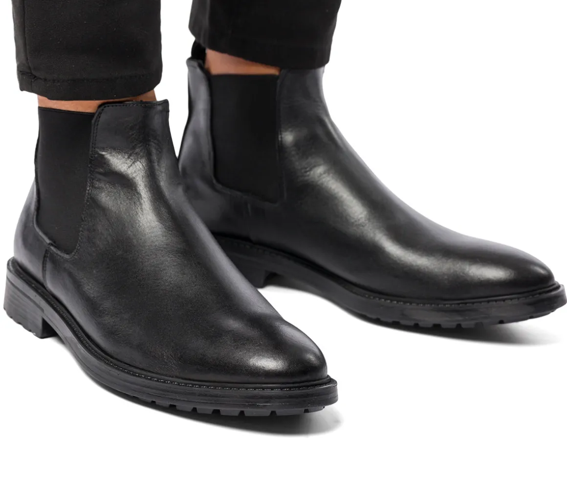 Stivaletti con elastici neri in pelle da uomo con suola chunky Primopiano